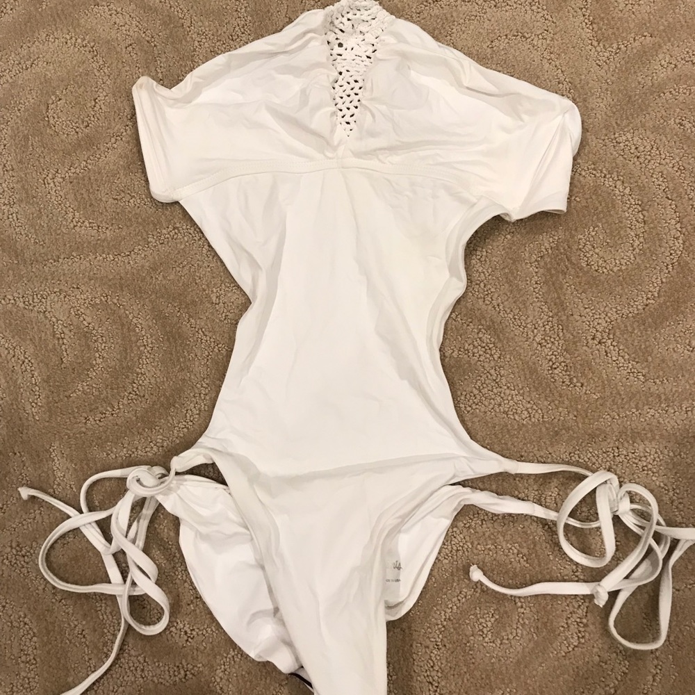 Frankie’s white cut out one piece